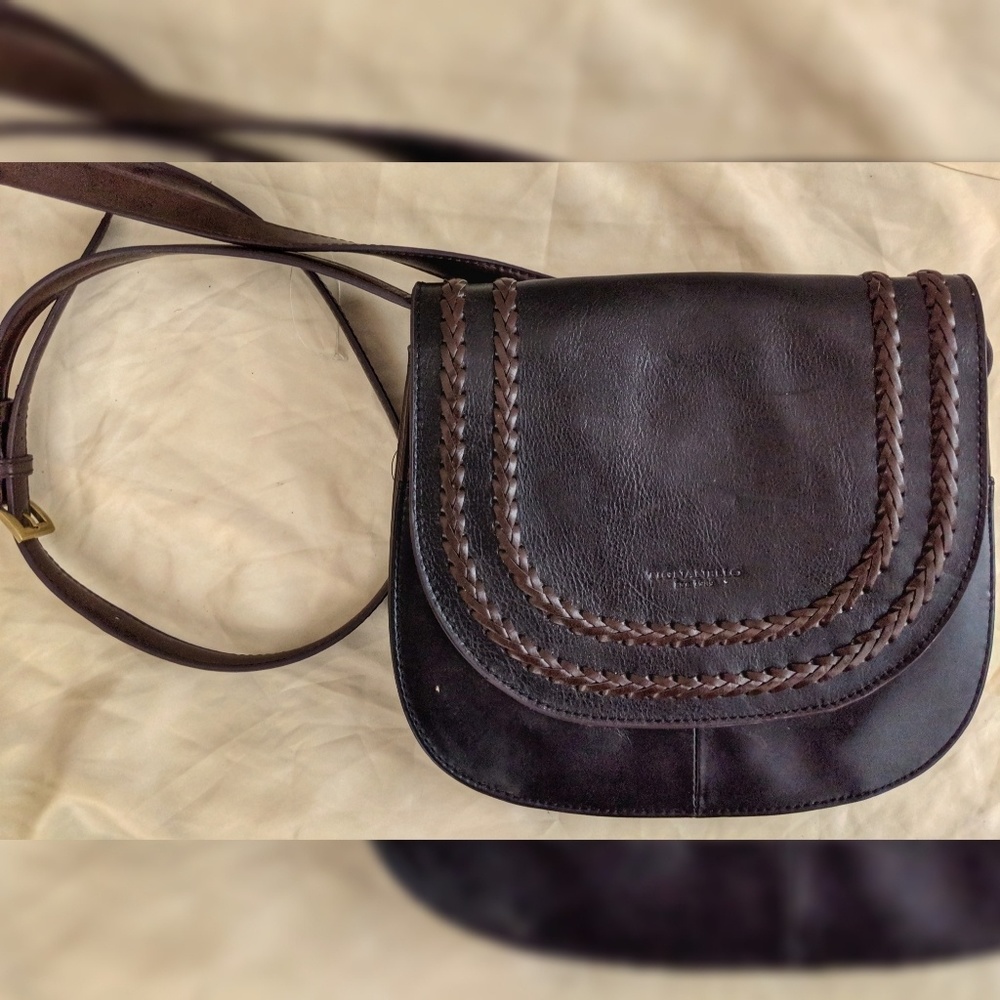 Black leather purse with brown stitching